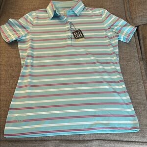 Kate Lord short sleeve golf shirt.